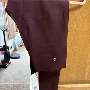 lululemon athletica Glow Up SHR Tight 28” burgundy